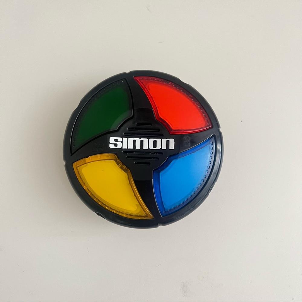 Simon Micro Series Electronic Game, Classic Simon Board Game in a Compact Size